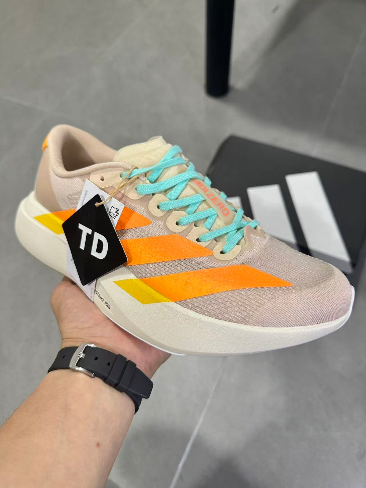 Adidas Lightstrike Pro Running Shoes, in Beige Orange - product image from the listing.