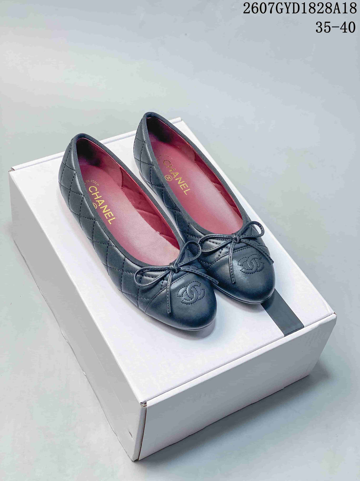 Chanel 26P Washed Denim Ballet Flats in Black and Blue - product image from the listing.