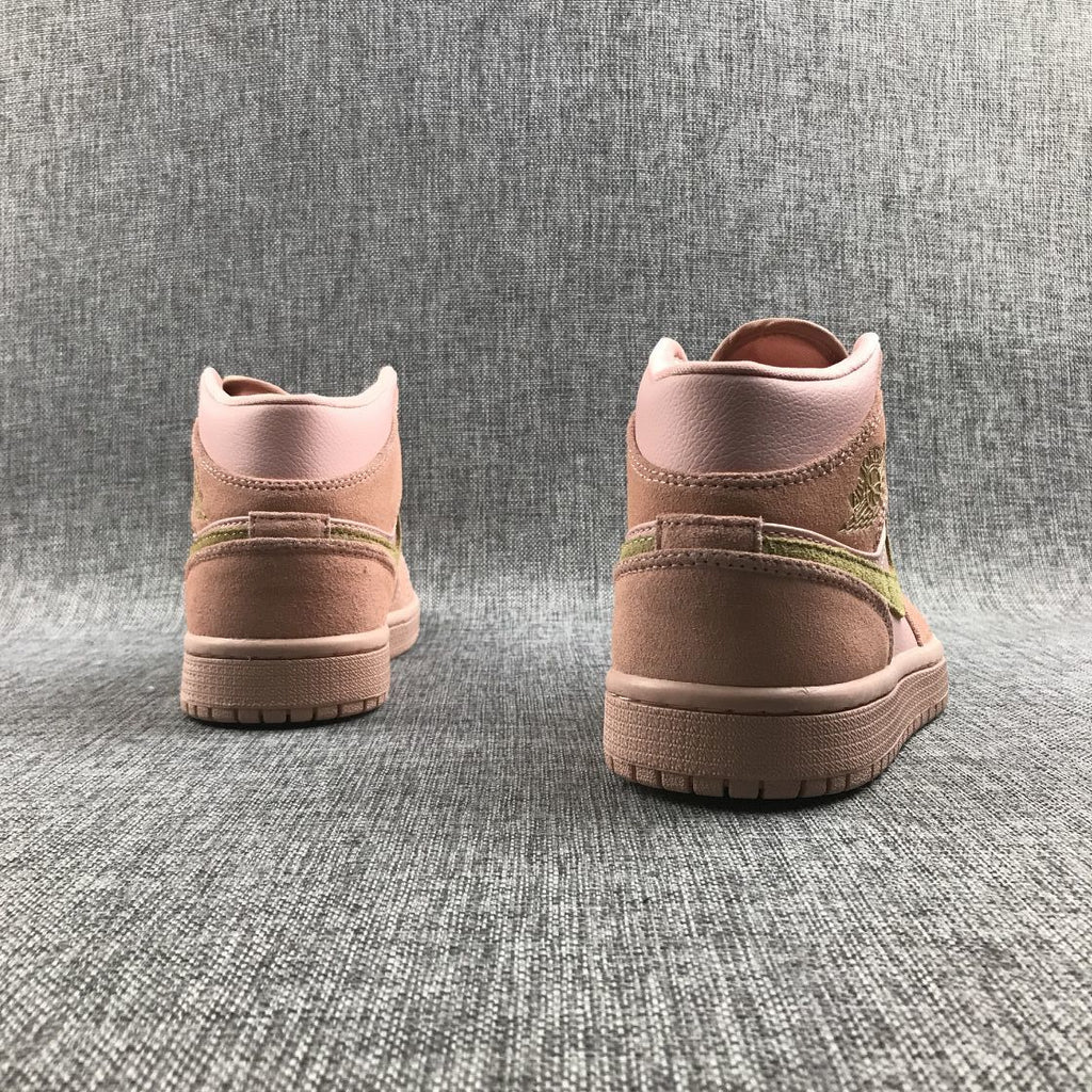 Jordan 1 Mid SE Sneakers in Pink 852542-600 - product image from the listing.