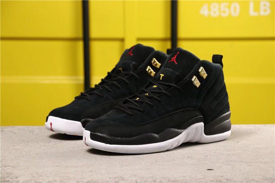 Air Jordan 12 Reverse Taxi Sneakers Black 153265-017 - product image from the listing.