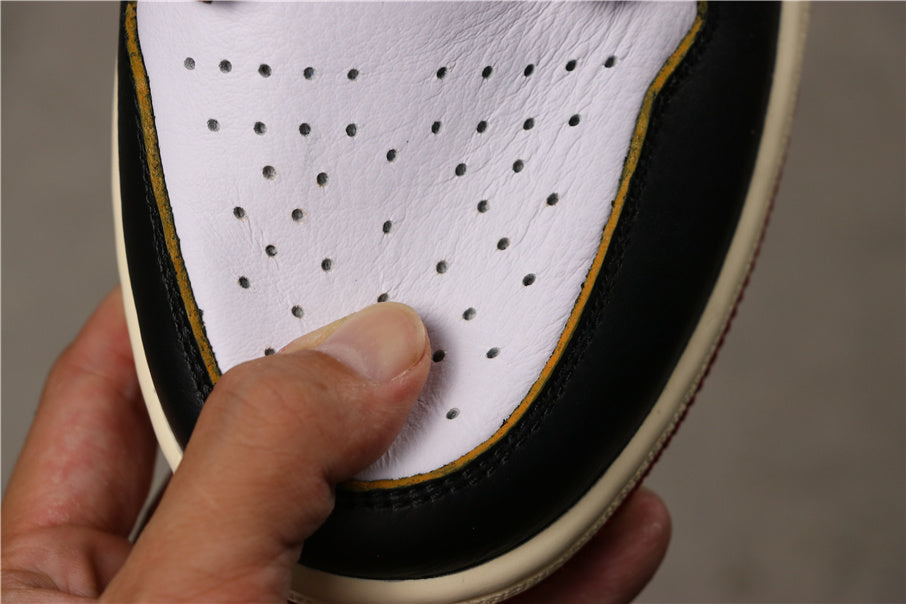 Air Jordan 1 Retro High OG NRG Sneakers White Black Varsity in Red - product image from the listing.