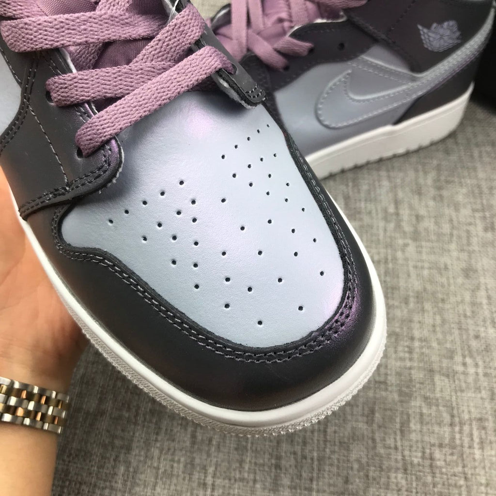 Jordan 1 Mid Sneakers in Purple AV5174-400 - product image from the listing.