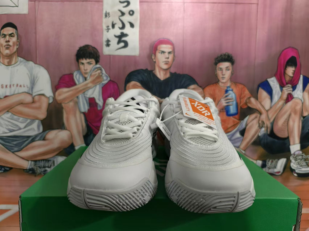 Nike White Basketball Trainers with Black Swoosh - product image from the listing.