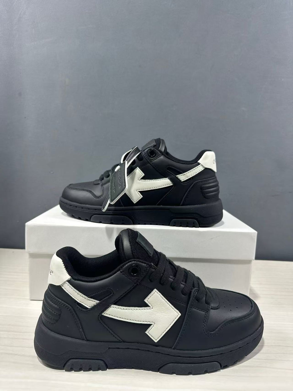 Off-White Out Of Office Low-Top Sneakers in Black White OMAI89C99LEA0191001 - product image from the listing.