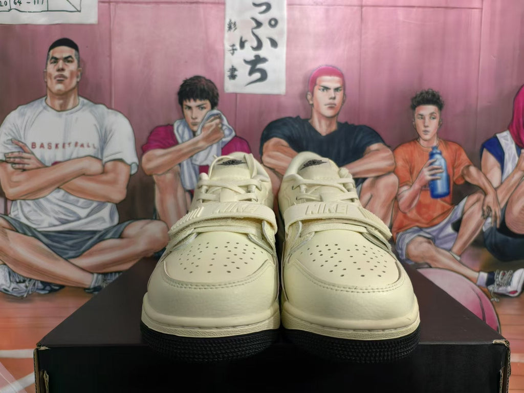 Cream and Black Jordan Legacy 312 Low Sneakers - product image from the listing.