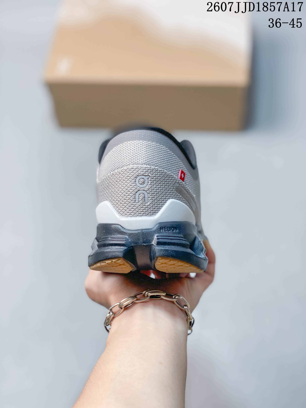 On Cloud X 4 Sneakers in Gray Black 2607JJD1857A17 - product image from the listing.