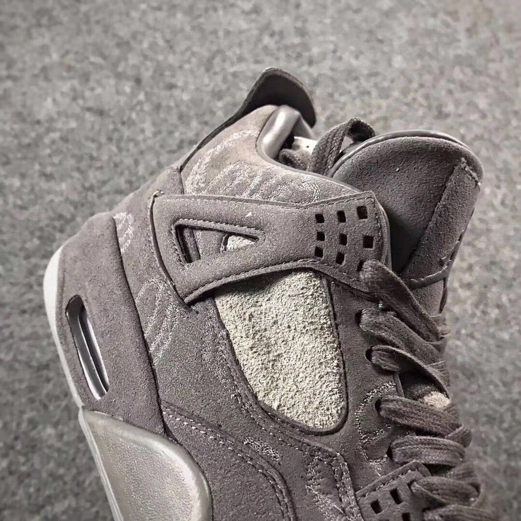 Grey Jordan 4 KAWS Sample High-Top Sneakers - product image from the listing.