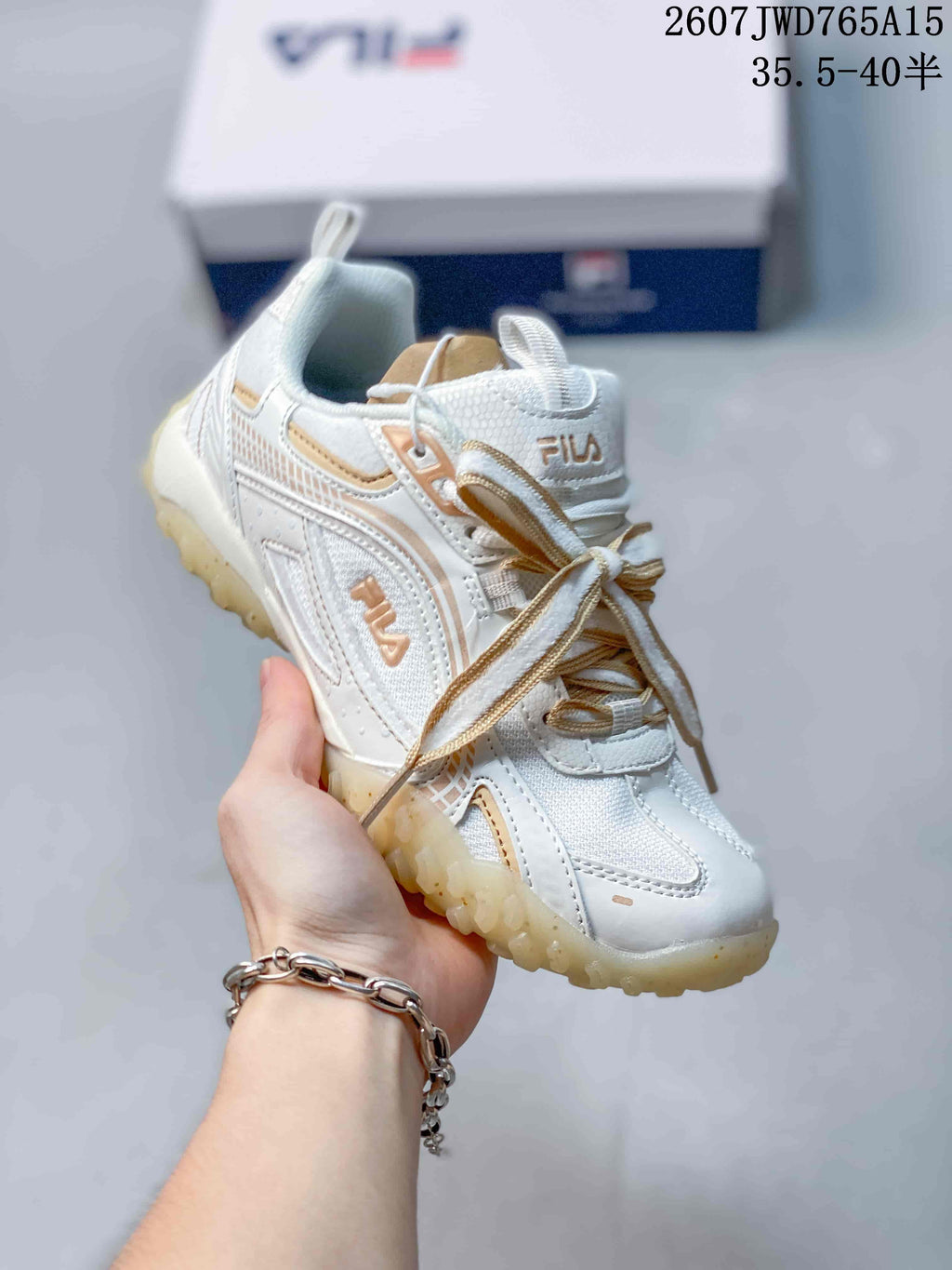 Women's FILA Pebble White Gold Sneakers 711650UTU - product image from the listing.