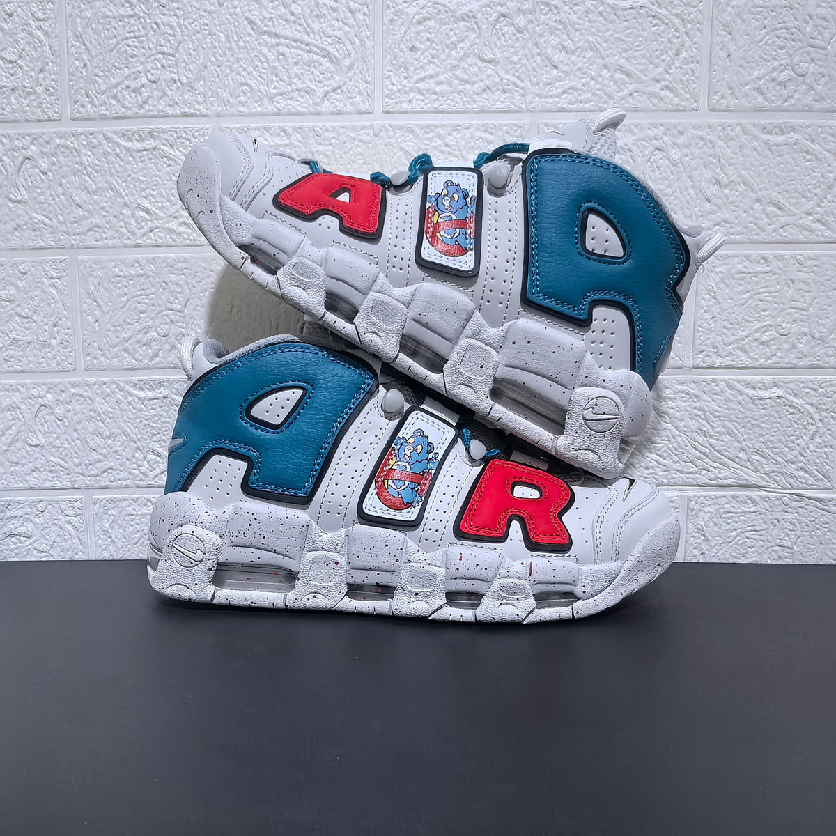 Nike Air More Uptempo Cartoon Bear Sneakers, in White Blue Red - product image from the listing.
