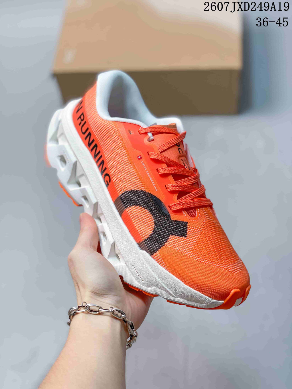 ON Cloudmonster 3 Hyper Sneakers in Orange 711490EEU - product image from the listing.