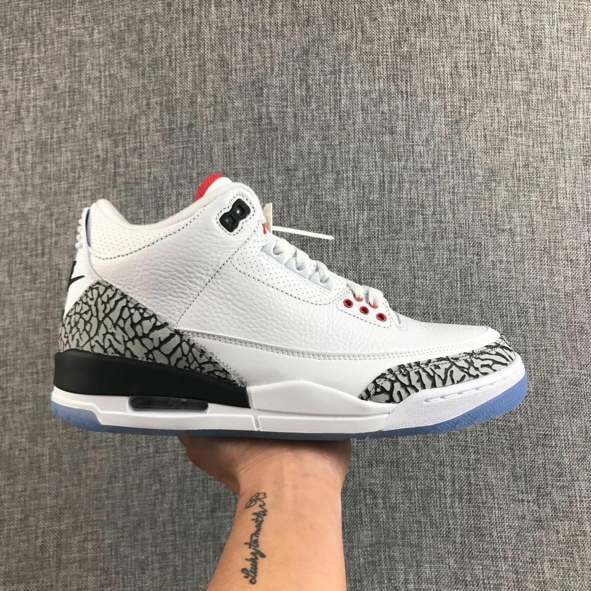 Air Jordan 3 White Cement Sneakers with Translucent Blue Sole - product image from the listing.