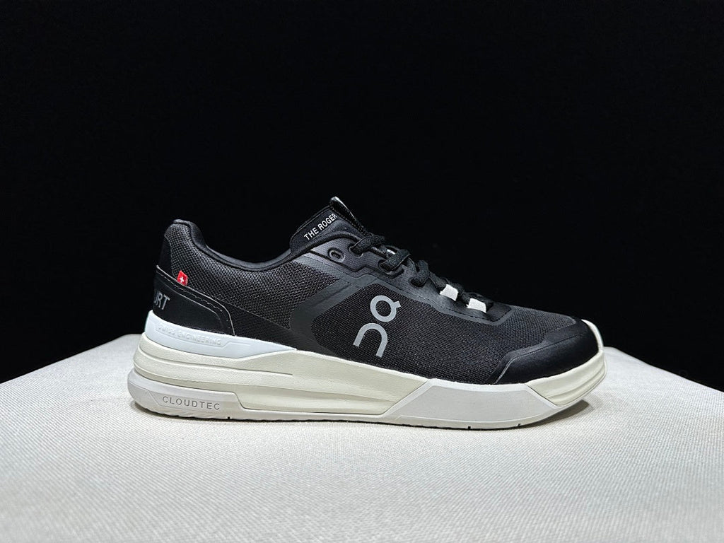 On THE ROGER Clubhouse Pro Tennis Sneakers in Black and White - product image from the listing.