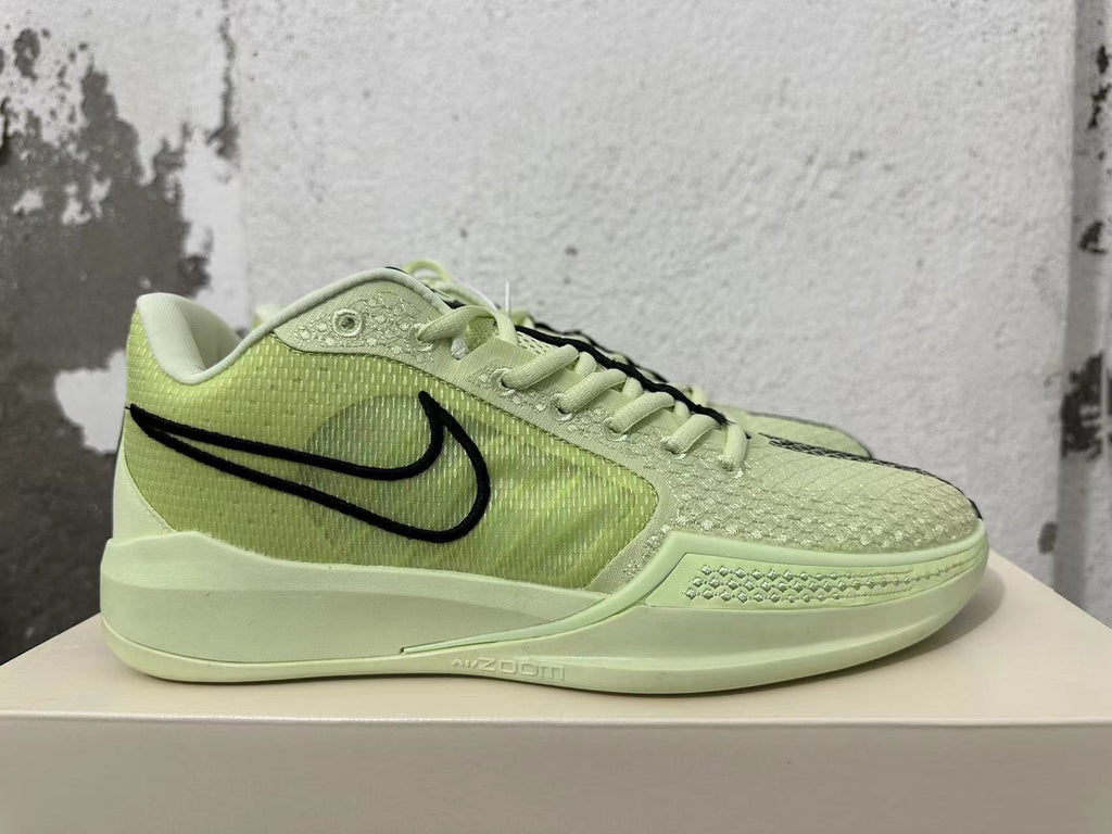 Pale Yellow and Black Nike Zoom Basketball Shoes - product image from the listing.