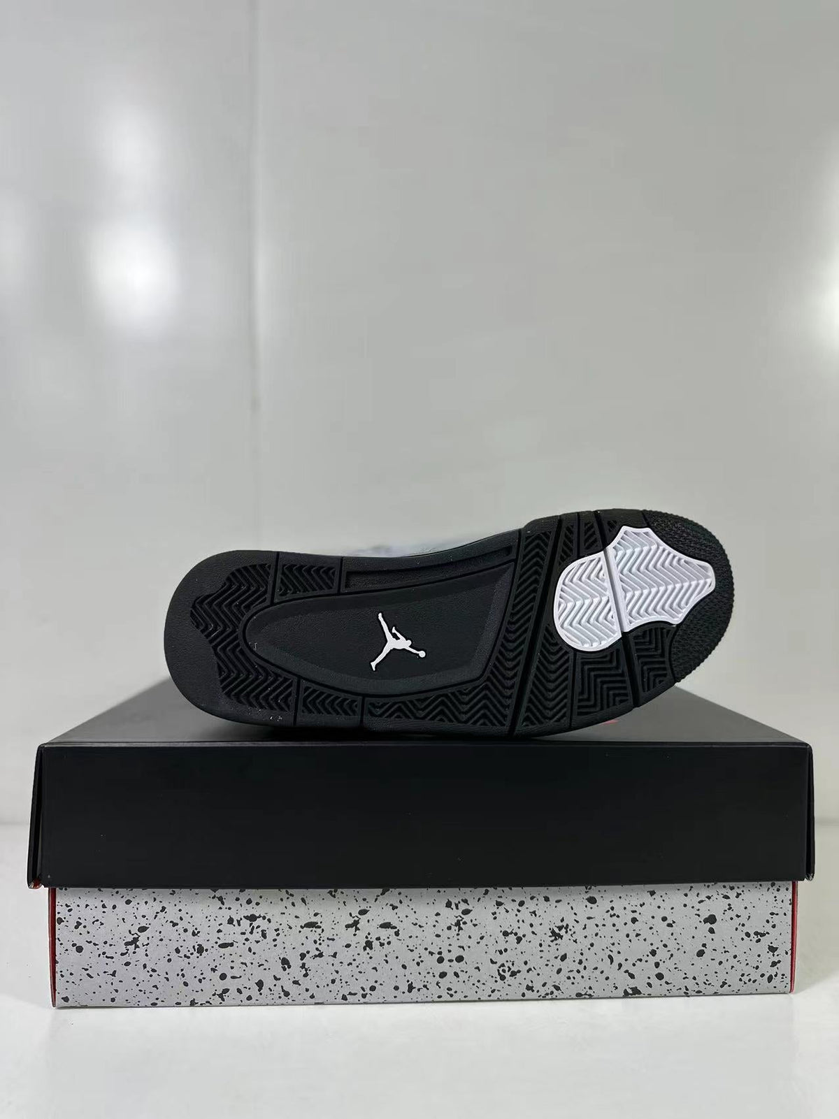Air Jordan 4 Retro Gray Black Sneakers AQ9129-005 - product image from the listing.