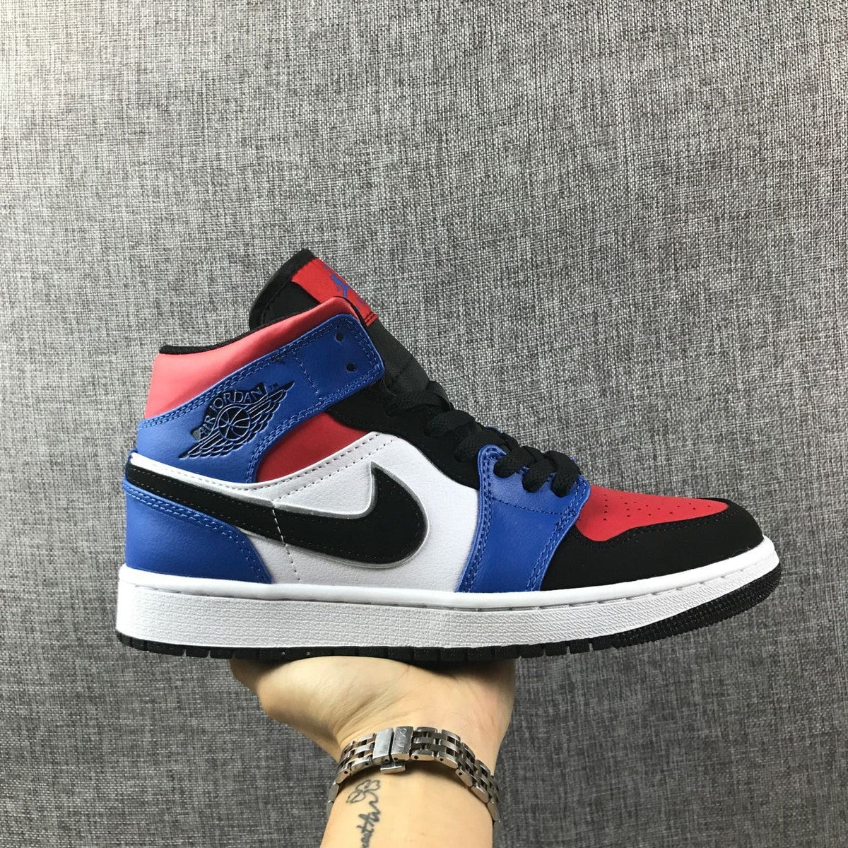 Air Jordan 1 Mid Sneakers in Blue Red Black White - product image from the listing.