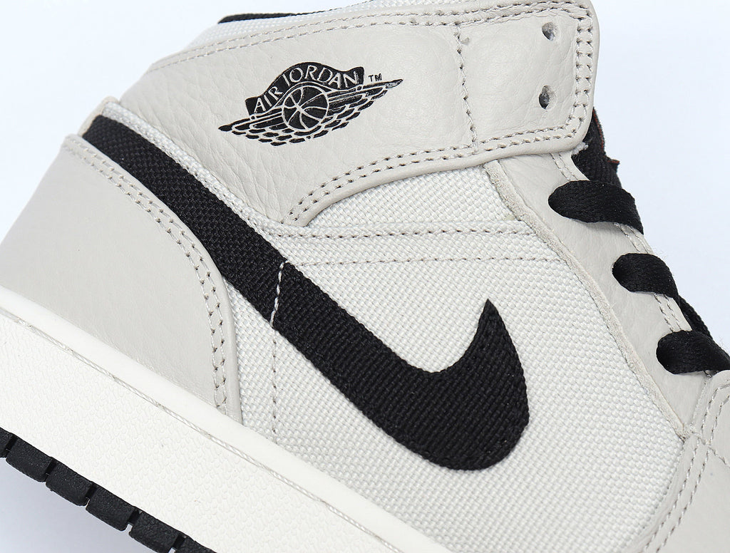 Light Smoke Grey and Black Jordan 1 Retro High OG Sneakers - product image from the listing.