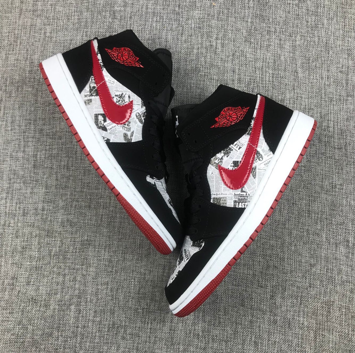 Air Jordan 1 Mid Sneakers in Black Red 852542-061 - product image from the listing.