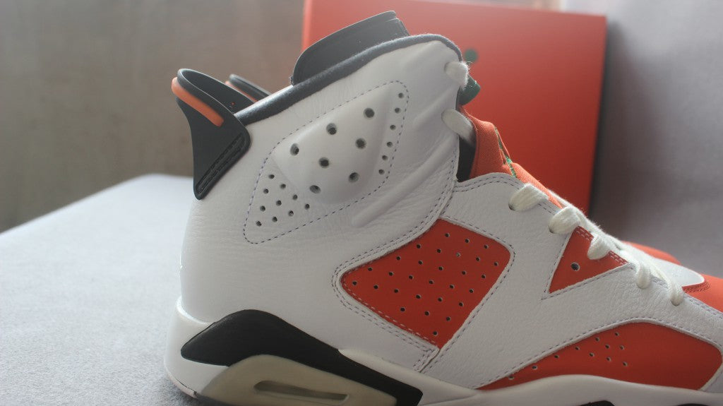 Air Jordan 6 Gatorade Basketball Sneakers in White Orange - product image from the listing.