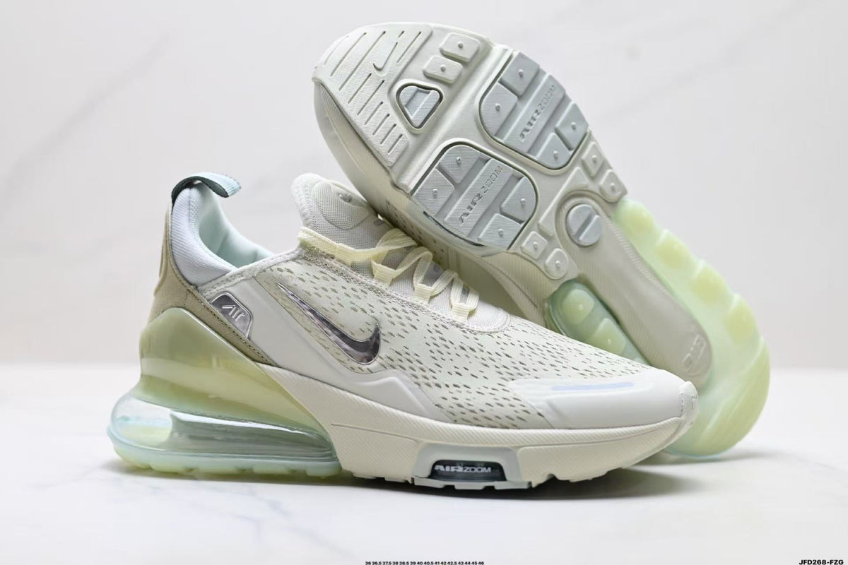 Light Green and White Nike Air Zoom Sneakers - product image from the listing.