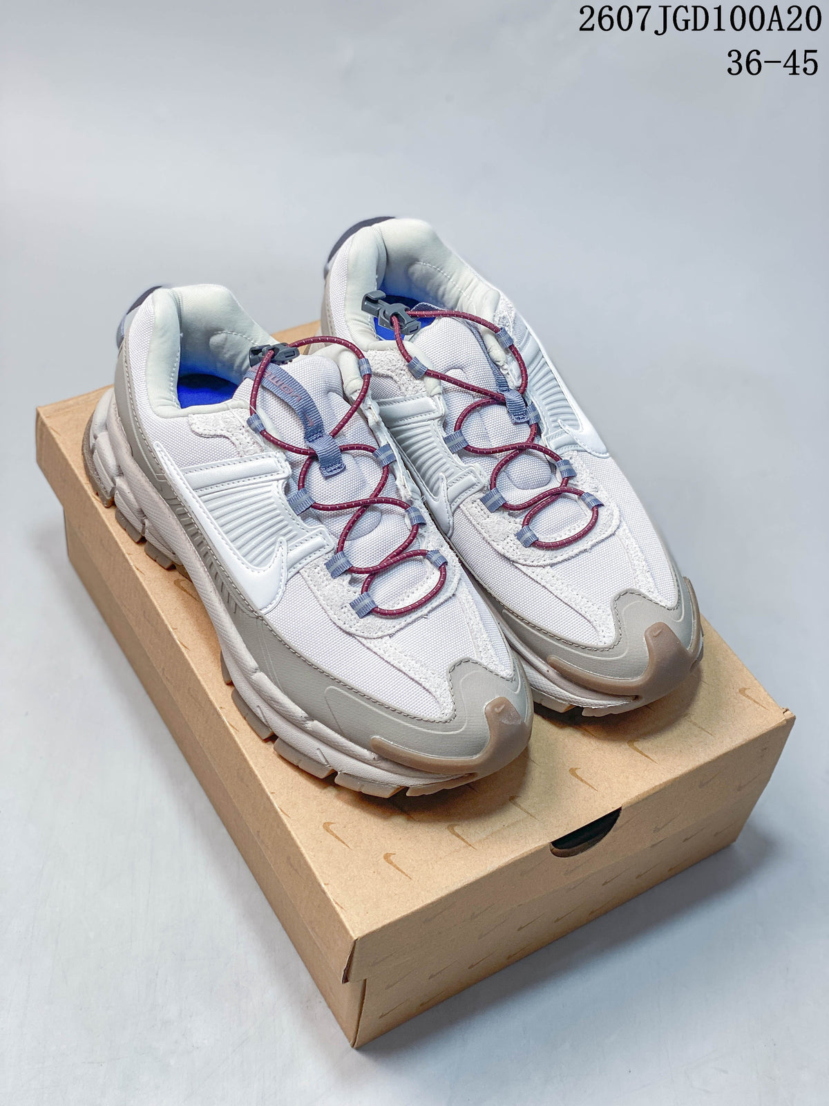 Nike Zoom Vomero Roam Sneakers in White Grey 2607TGD100A20 - product image from the listing.