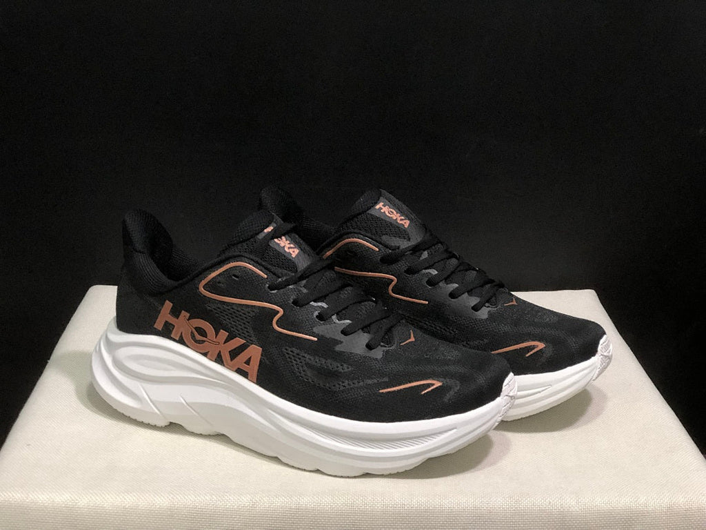 HOKA Clifton 10 Running Shoes, in Black and White - product image from the listing.