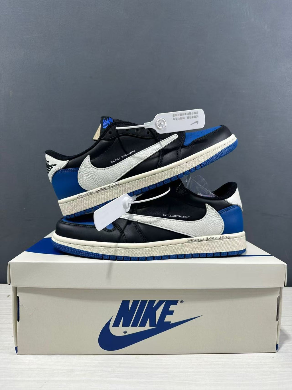 Air Jordan 1 Low Travis Scott Fragment Black Blue Sneakers - product image from the listing.