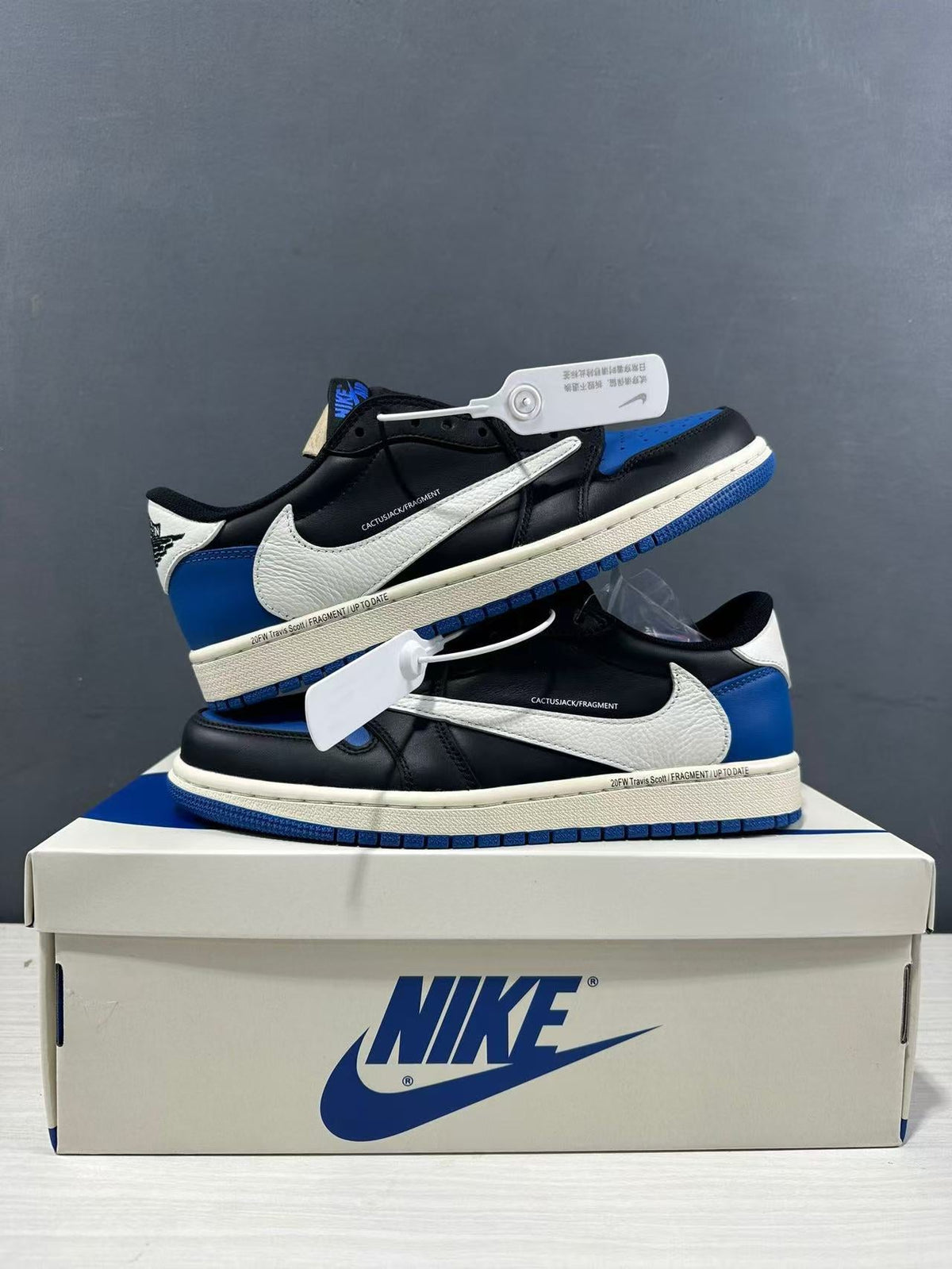 Air Jordan 1 Low Travis Scott Fragment Black Blue Sneakers - product image from the listing.