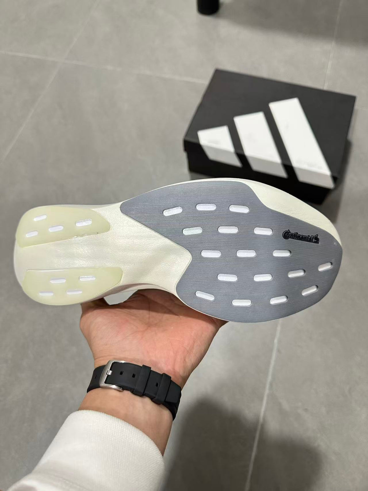 Gray and Blue Adidas Lightstrike Pro Running Shoes - product image from the listing.