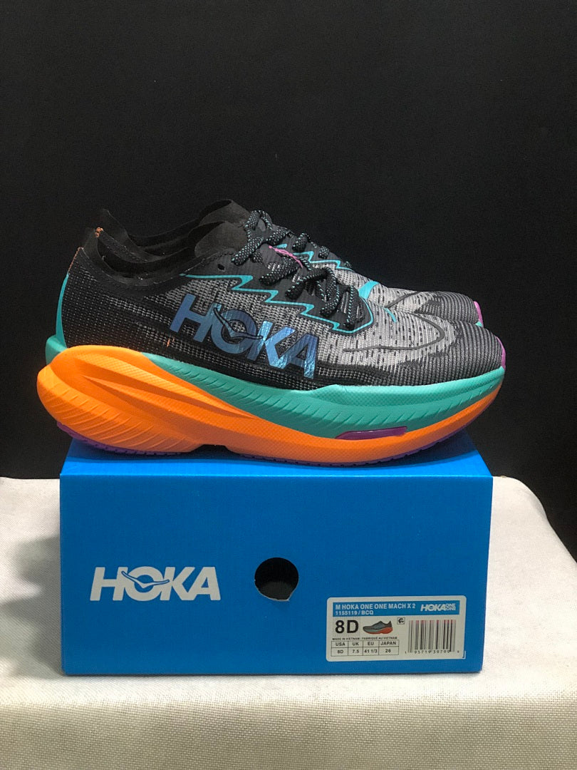 HOKA Mach X 2 Running Shoes, in Black and Turquoise - product image from the listing.