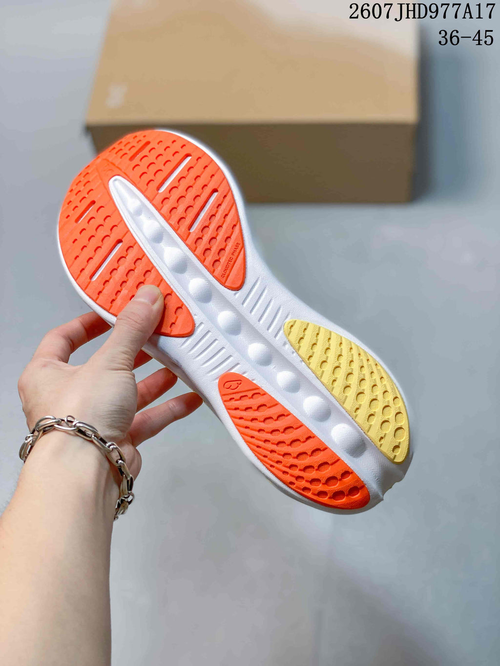 On Cloudtilt Sneakers in White Orange - product image from the listing.
