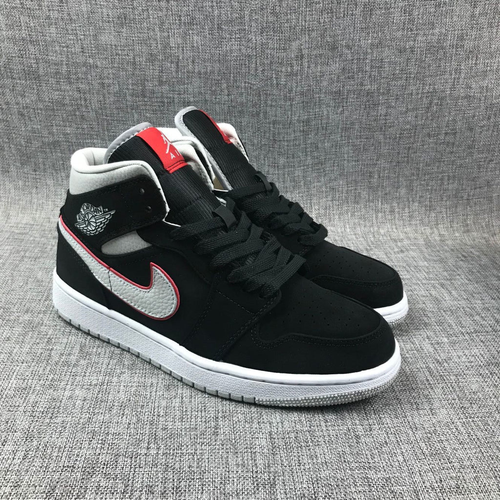 Air Jordan 1 Mid Black, Sneakers in White & Red 554724-060 - product image from the listing.