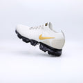 Nike Air VaporMax Flyknit Sneakers in White Gold Black 942842-010 - product image from the listing.