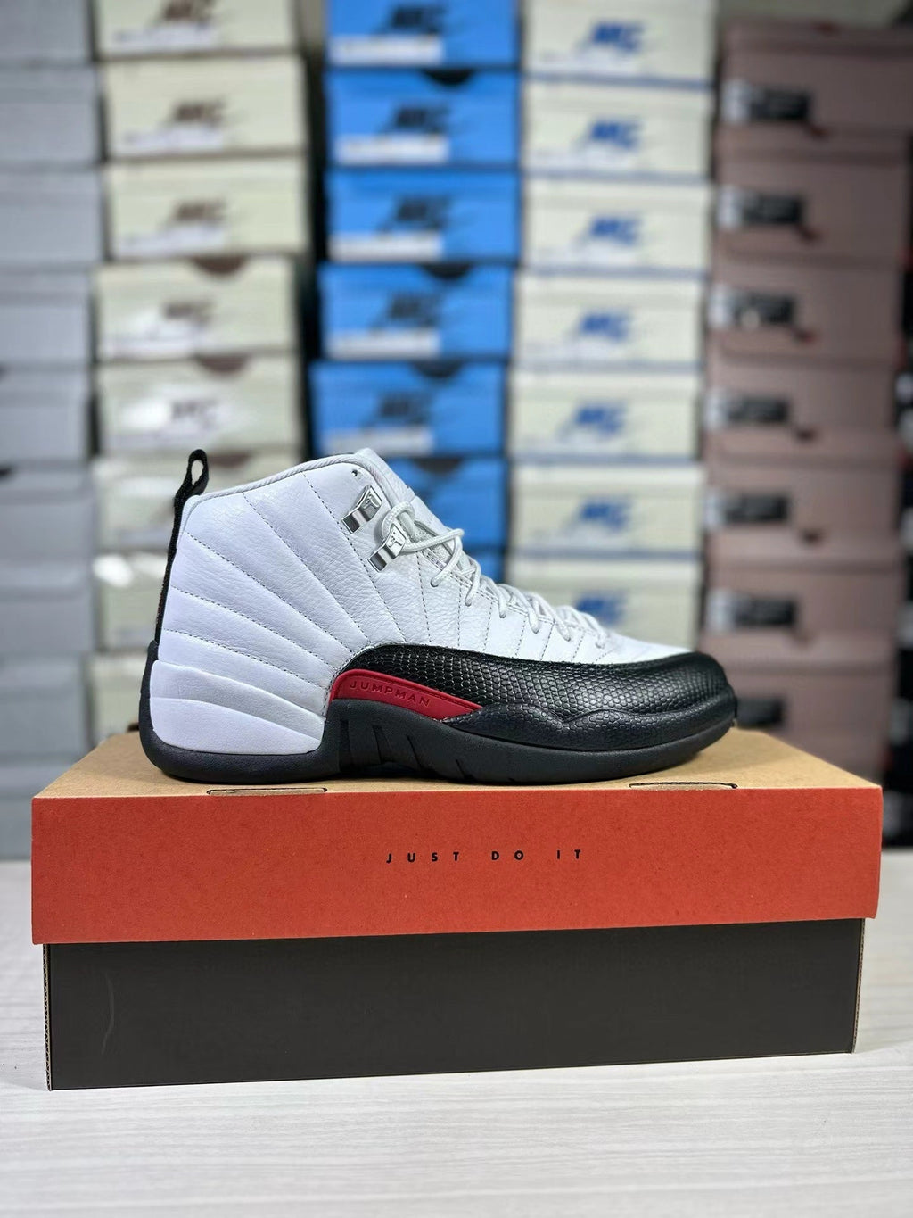 Air Jordan 12 Retro White Black Red CT8013-162 - product image from the listing.