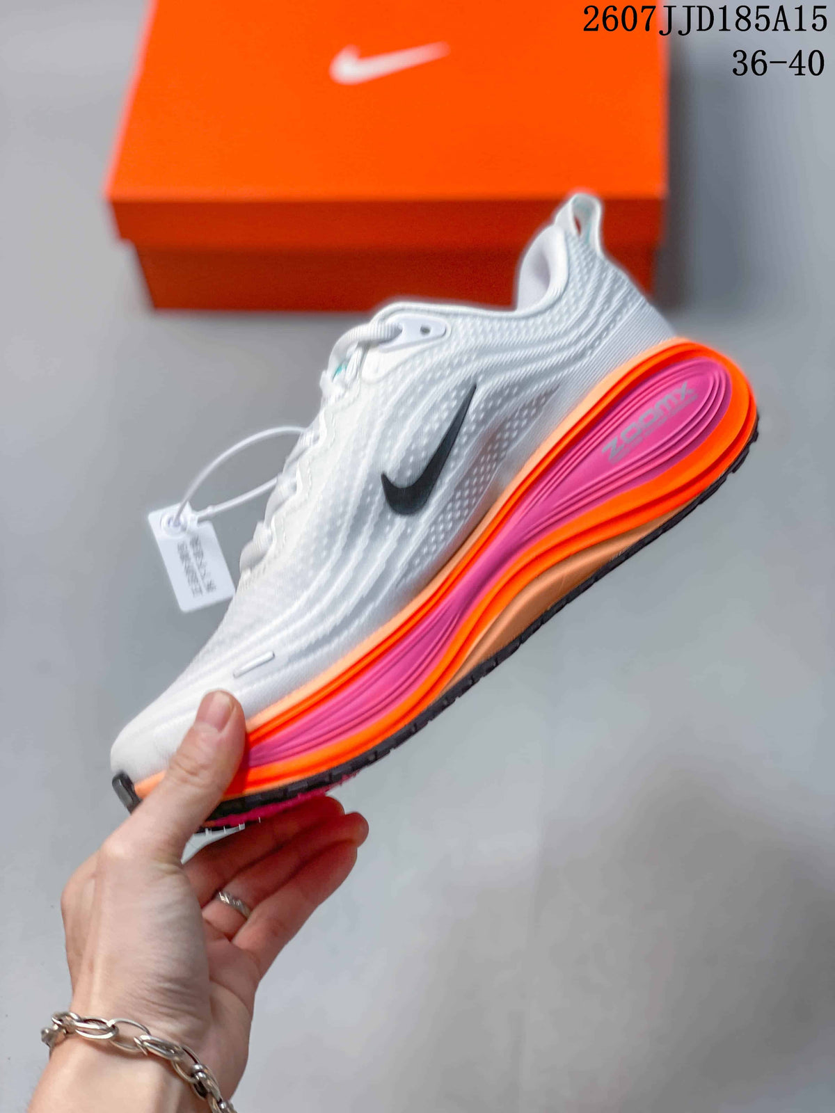 Nike Vomero Plus Running Shoes in White Orange Pink 2607JJD185A15 - product image from the listing.