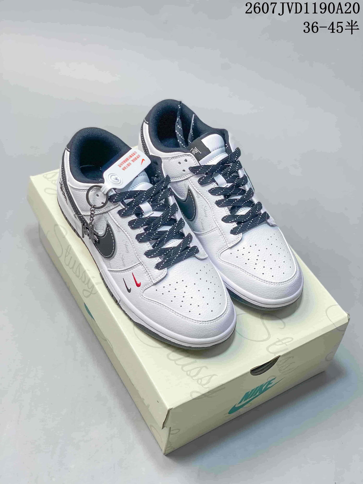 Nike SB Dunk Low Stüssy Sneakers in Off-White Black - product image from the listing.