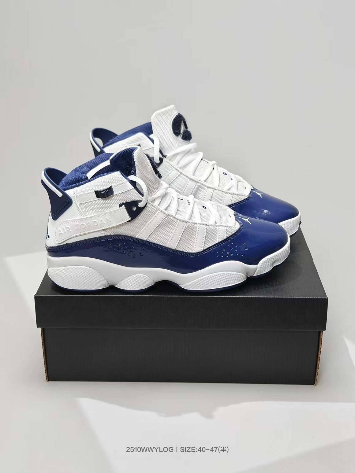 Jordan 6 Sneakers in White and Navy - product image from the listing.