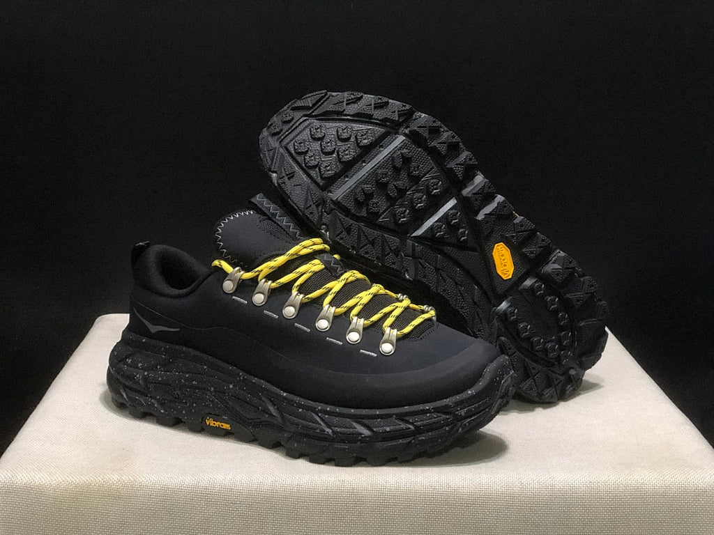 HOKA Tor Summit Trail Sneakers in Black and Yellow - product image from the listing.