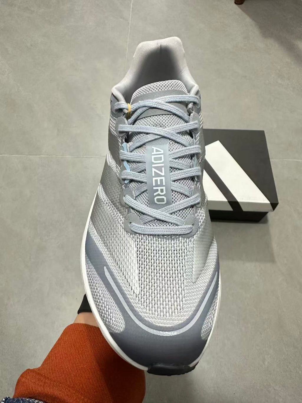 Nike ZoomX Invincible Run 4 Road Running Shoes in Grey - product image from the listing.