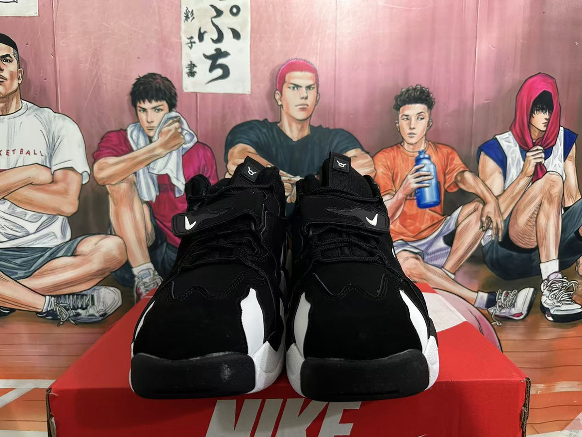 Nike High-Top Sneakers in Black and White - product image from the listing.