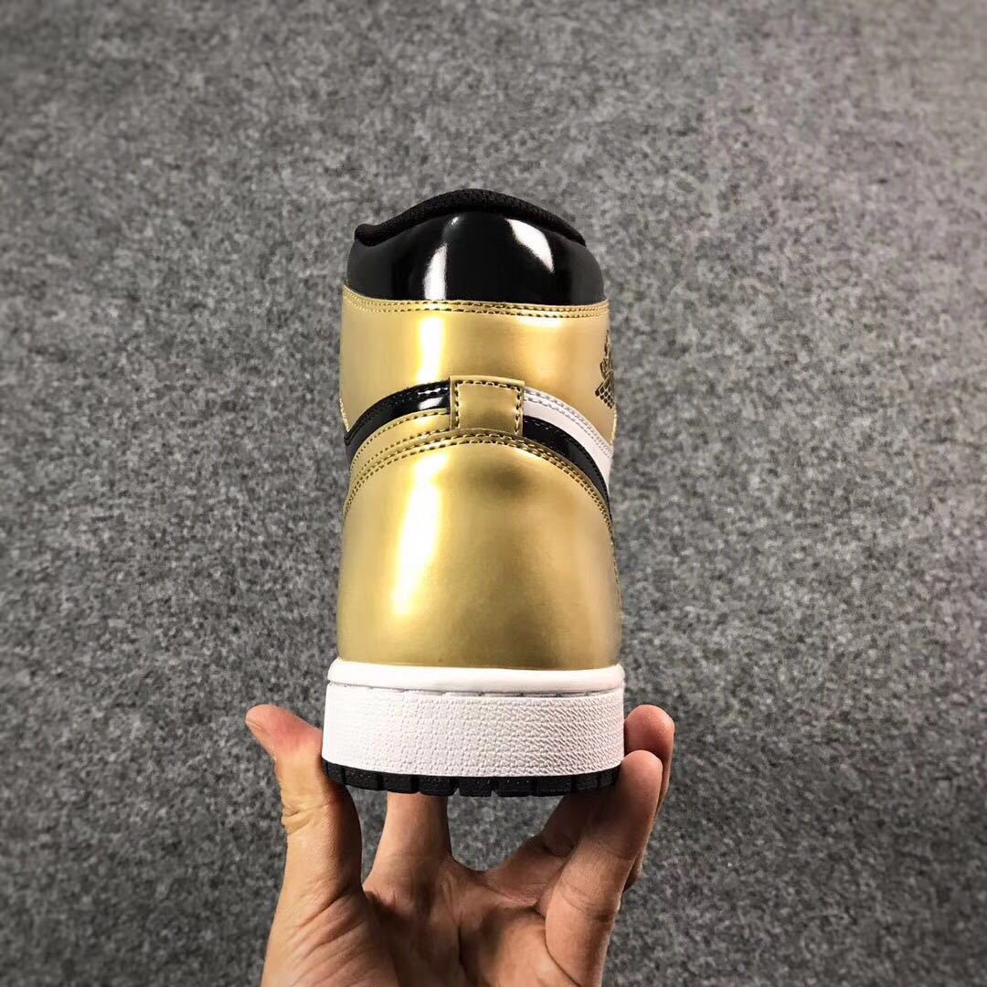 Jordan 1 High Mismatched Sneakers in Black Gold White - product image from the listing.