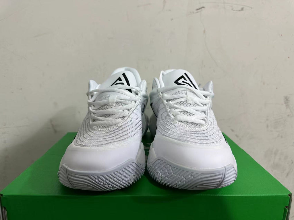 Nike White and Grey Basketball Trainers with Black Accents - product image from the listing.