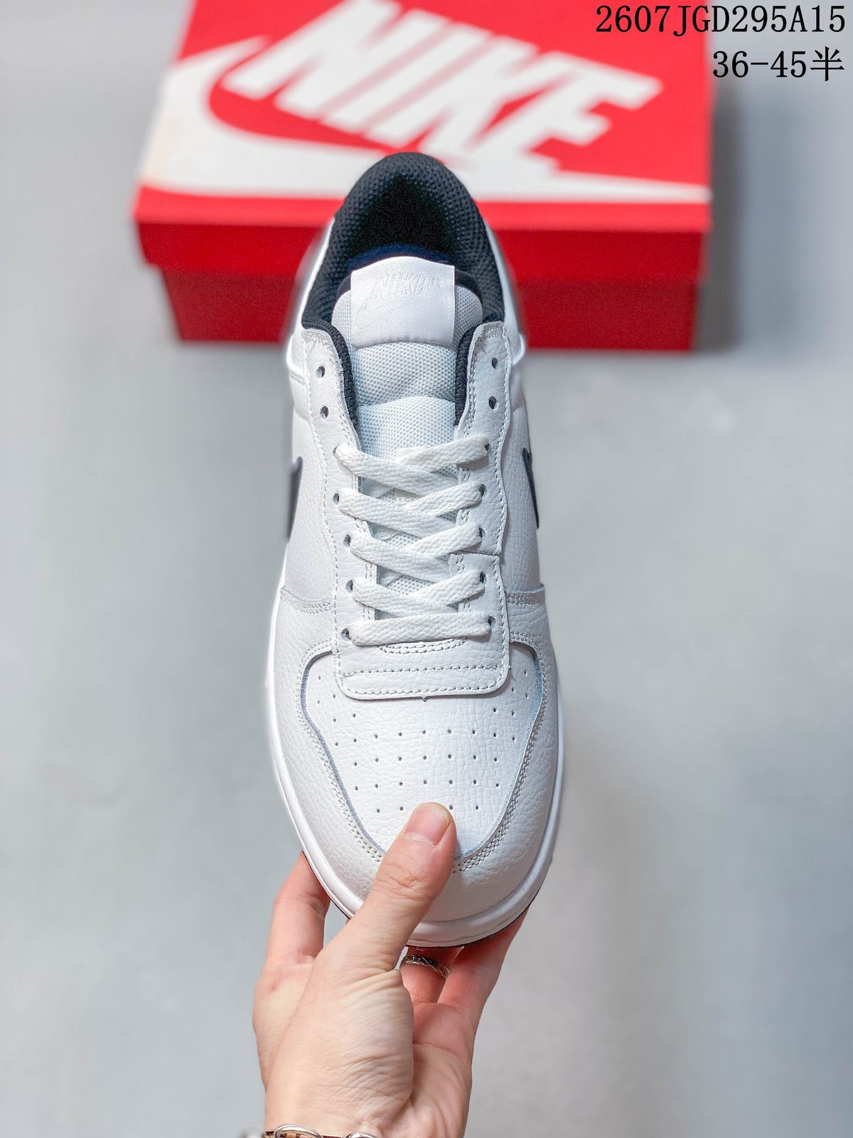 Nike SB Dunk Low Pro Sneakers in White Black 2607JGD295A15 - product image from the listing.