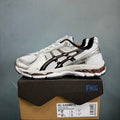 ASICS GEL-KAYANO 12.1 Sneakers in White Brown Silver 1203A759-104 - product image from the listing.
