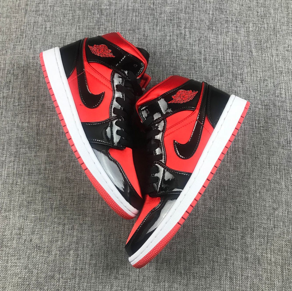 Air Jordan 1 Mid Sneakers in Black Red White BQ6472-600 - product image from the listing.