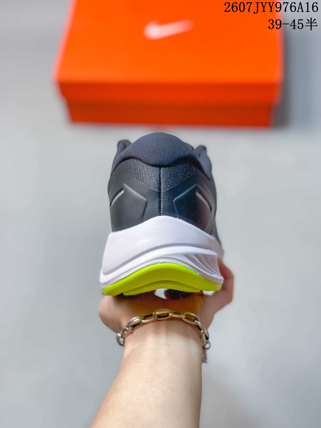 Nike Zoom Structure 23 Running Sneakers in Gray White - product image from the listing.