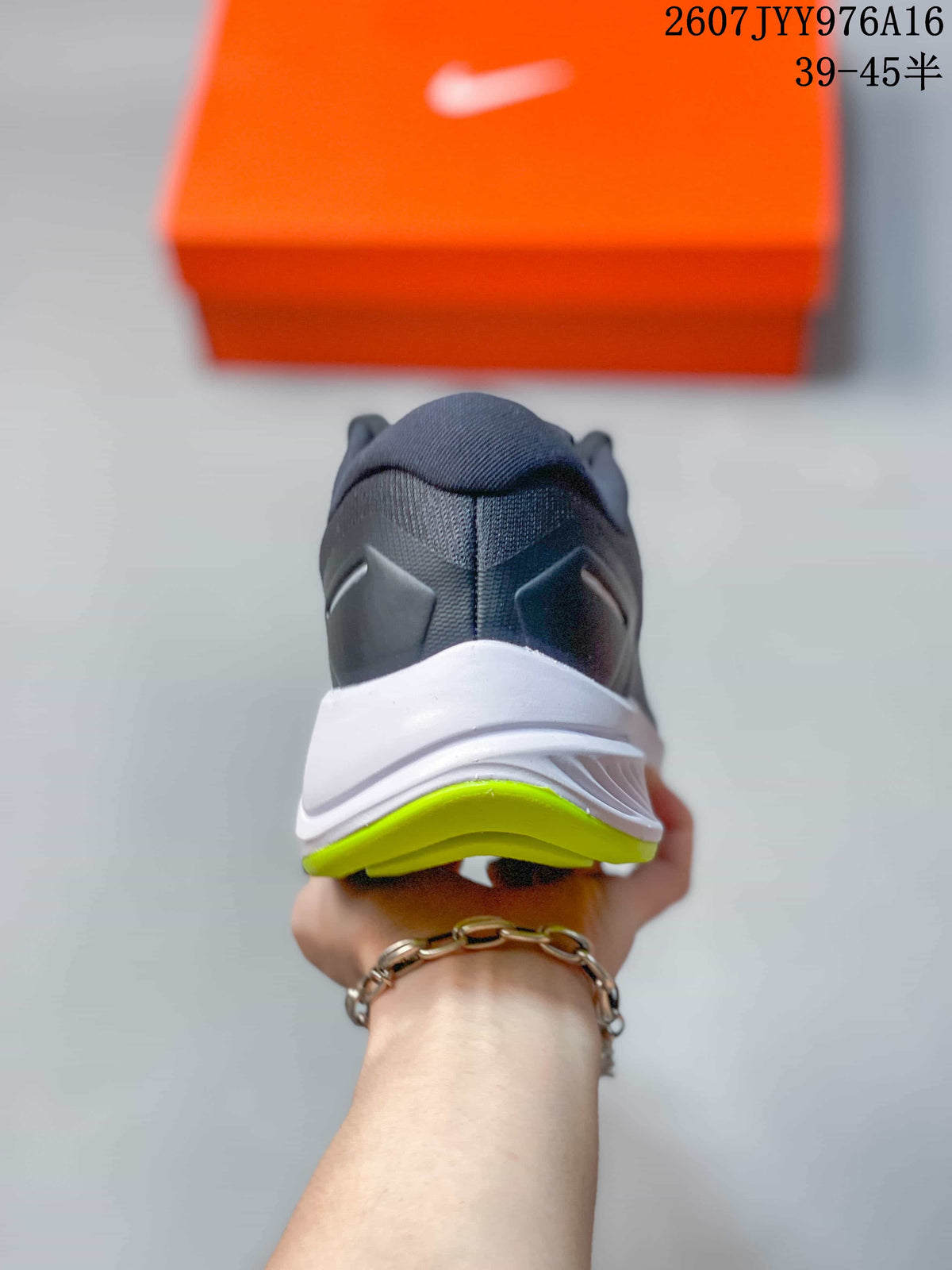 Nike Zoom Structure 23 Running Sneakers in Gray White - product image from the listing.