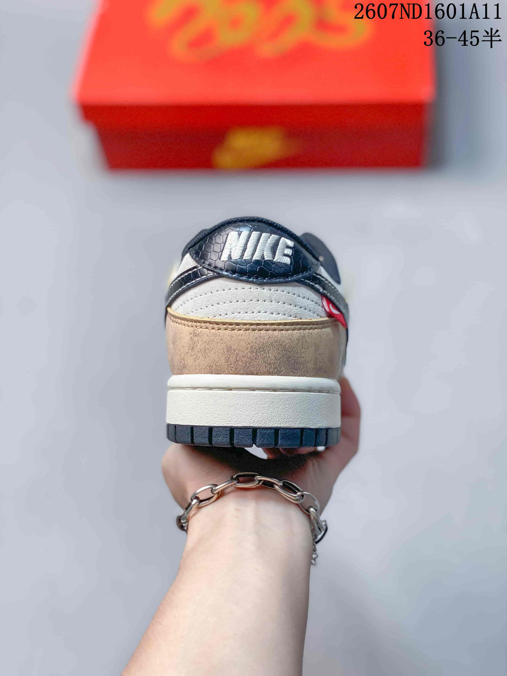 Nike SB Dunk Low Sneakers in Off-White Tan White Navy - product image from the listing.