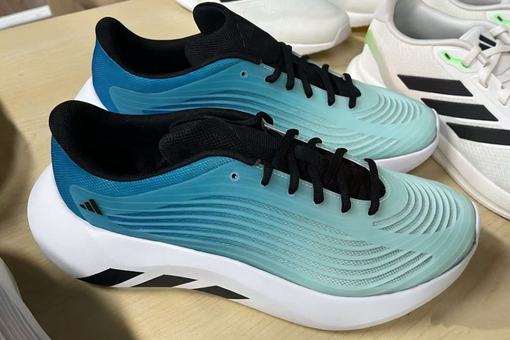 Light Aqua and Black Nike Air Max 97 Sneakers - product image from the listing.