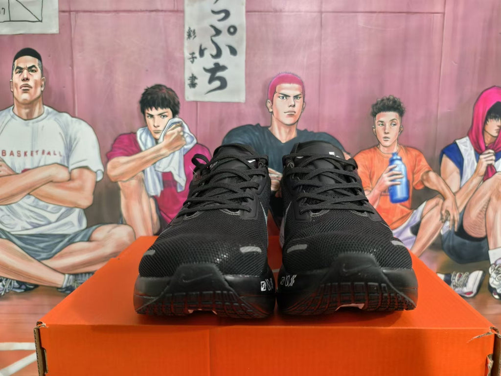 Nike ZoomX Running Shoes in Black and White - product image from the listing.