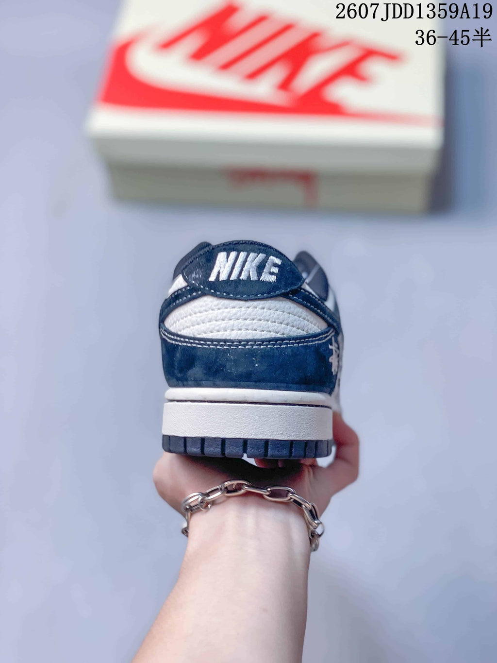 Air Jordan 1 Low Navy White Sneakers 2607JDD1359A19 - product image from the listing.